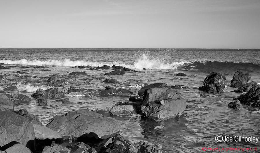 Tide over rocky shore at Burnmouth
