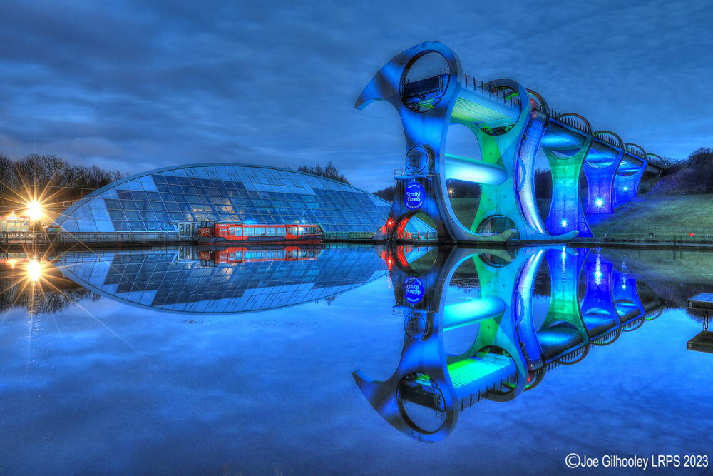 The Falkirk Wheel lights on after sunset