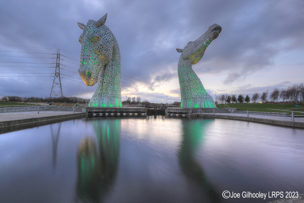 The Kelpies lit at night