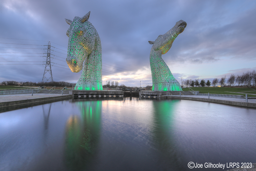The Kelpies lit at night