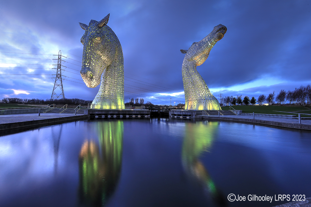 The Kelpies lit at night