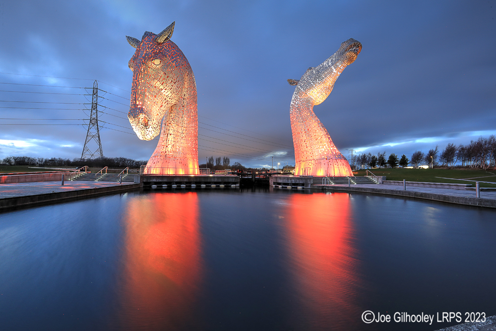The Kelpies lit at night