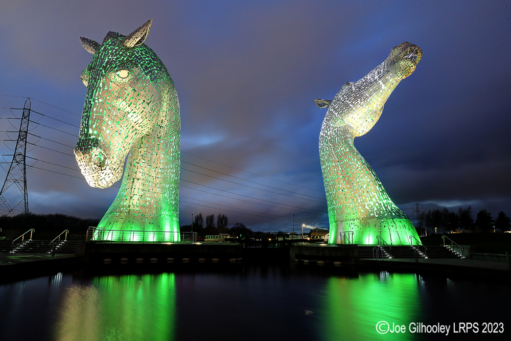 The Kelpies lit at night