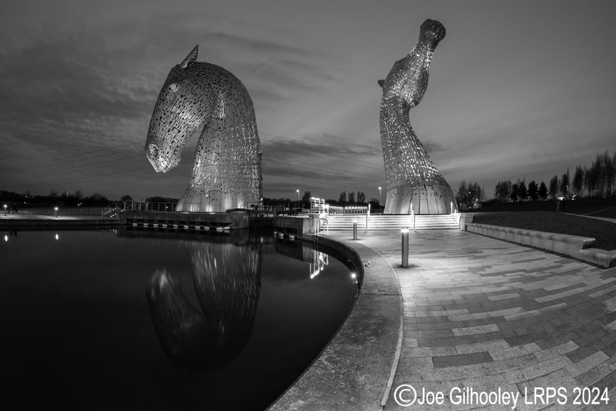 The Kelpies lit at night