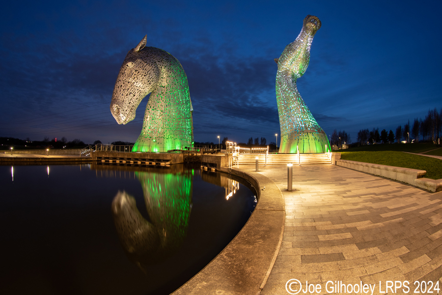 The Kelpies lit at night