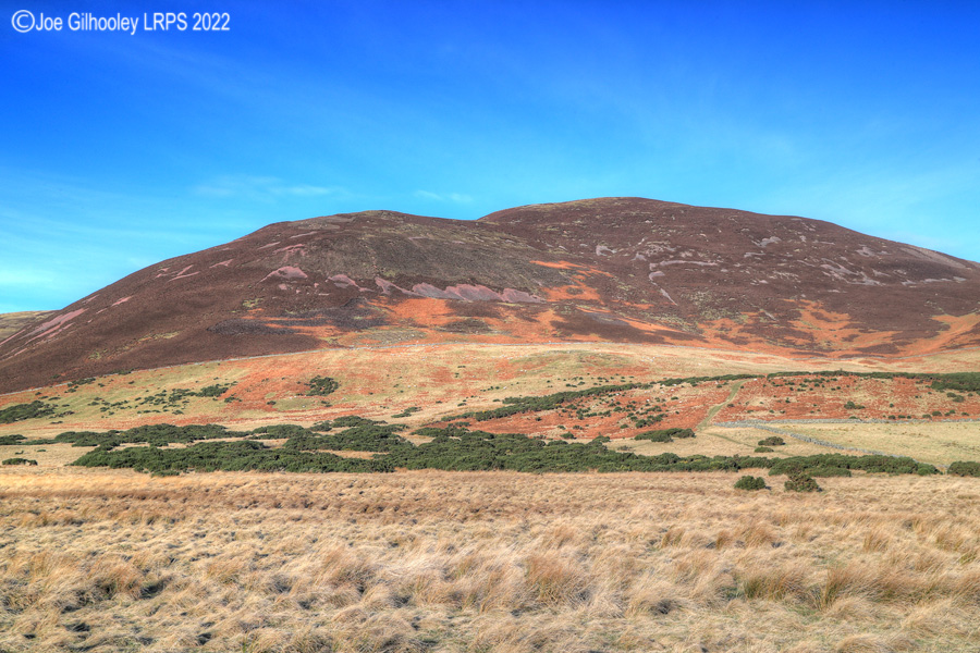 Carnethy Hill in Pentland Hills with a wonderful winter's blue sky