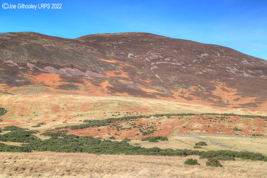 Carnethy Hill in Pentland Hills with a wonderful winter's blue sky